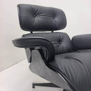 Chefsessel & Ottoman – Skulpturales Leder Lounge-Set | DREAMOA