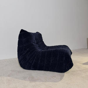 Niedriges skulpturales Sofa aus schwarzem Glitzer | DREAMOA