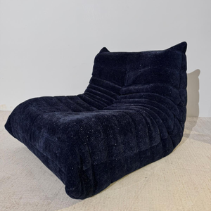 Niedriges skulpturales Sofa aus schwarzem Glitzer | DREAMOA